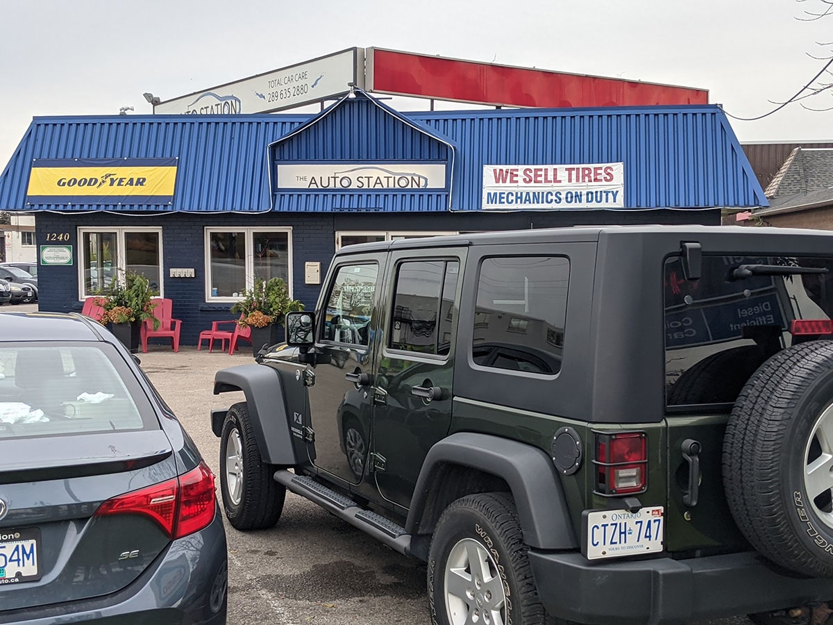 jeep wrangler in the parking lot at the auto station