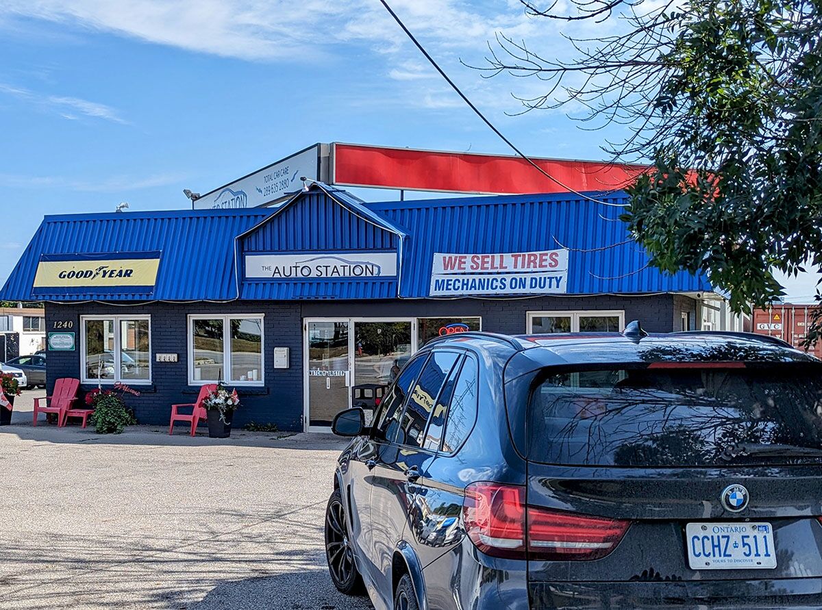 BMW parked in front of The Auto Station