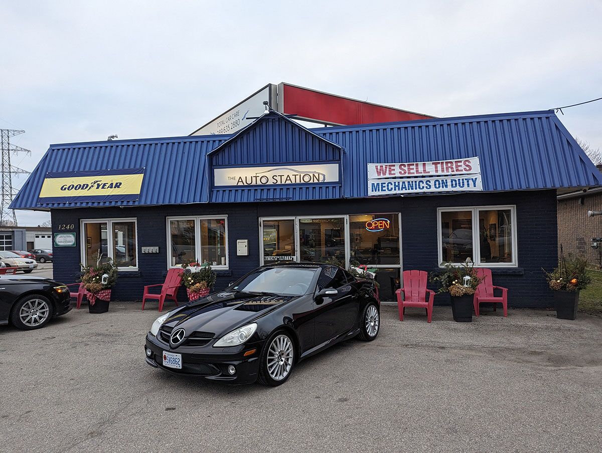 mercedes parked in front of auto station
